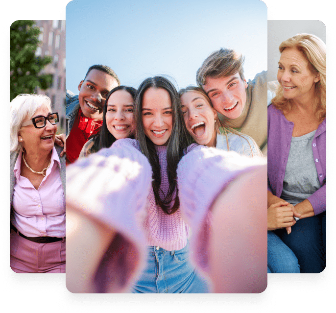 A diverse group of friends smiling and posing for a fun selfie together, capturing a joyful moment